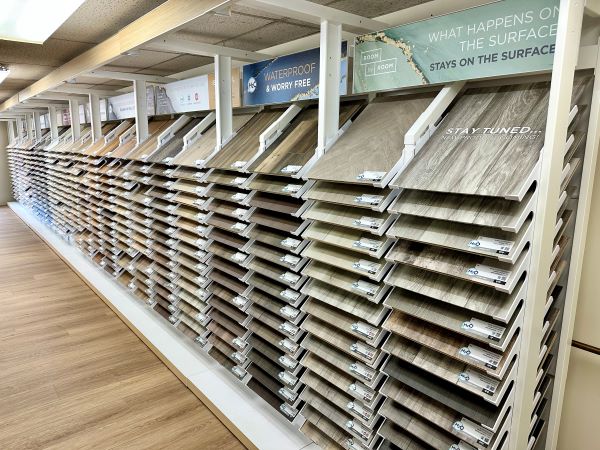 luxury vinyl hardwood laminate flooring samples in flooring store in williamsport, PA